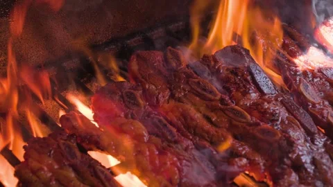 Slow Motion Of High Flames Cooking Beef Short Ribs Stock Footage 341560690
