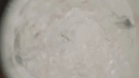 Slow motion of high functioning table blender mixing and spinning water Stock Footage 208764167