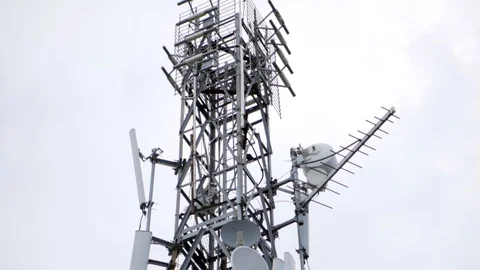 Slow motion high to low pan of radar tower Stock Footage 91171553