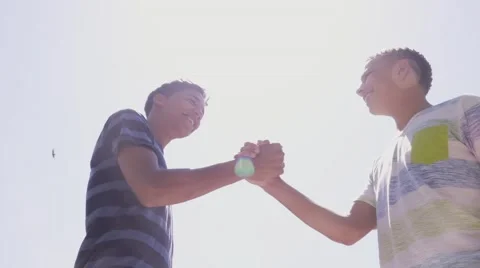 Slow Motion Hispanic And White Teenagers Shaking Hands Stock Footage 64279003
