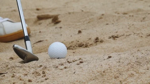 Slow motion of Hitting the golf ball out of the sand Stock Footage 113512777