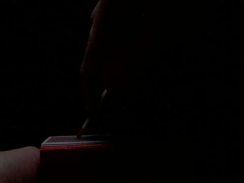 Slow Motion Horizontal Match Strike and burn (HD) Stock Footage 366137