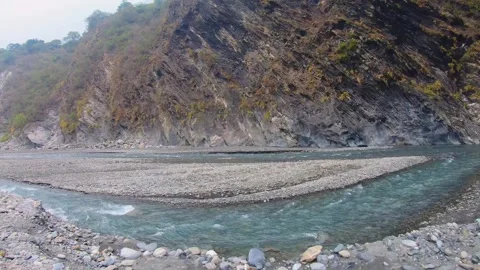 Slow motion horizontal over look to river water surged rapidly with speed raced  Stock-Footage 266501730