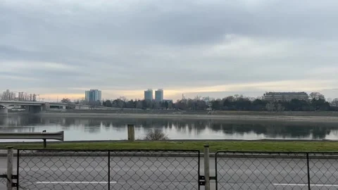 Slow-motion horizontal video on winter or early spring wide river landscape. Stock Footage 310960256