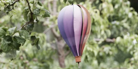 Slow Motion Hot Air Balloon Spinner in Sunlight Stock Footage 320552423