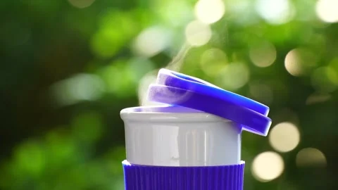 Slow motion. Hot ceramic white coffee cup with smoke Stockbeeldmateriaal 253248787