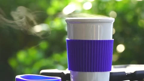 Slow motion. Hot ceramic white coffee cup with smoke Stockbeeldmateriaal 253249326