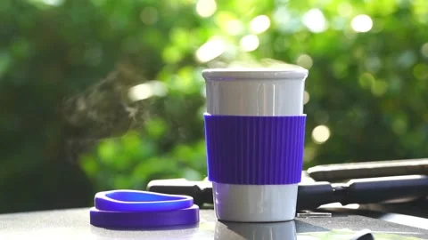 Slow motion. Hot ceramic white coffee cup with smoke Stockbeeldmateriaal 253249410