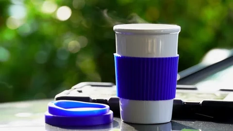 Slow motion. Hot ceramic white coffee cup with smoke Video stock 253250793