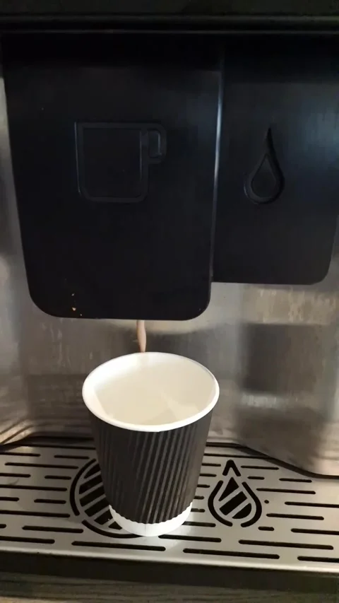 Slow Motion Of Hot Chocolate Being Dispensed Into A Cup, London, UK Stock Footage 280211677