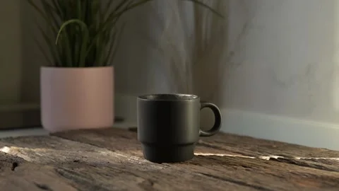 Slow motion hot coffee mug with espresso and americano cozy kitchen setting warm Video stock 296997357