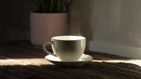 Slow motion hot coffee mug concept espresso and americano delight in a cozy Stock Footage 296997700