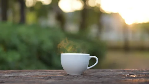 Slow motion hot drink delight espresso and americano experience outdoor setting Stock Footage 296998617