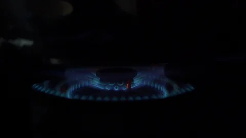 Slow motion, hot flame fire of gas stove in kitchen Stock Footage 128860505