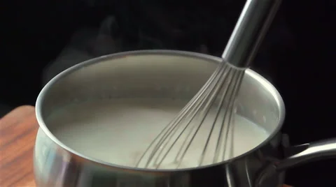 Slow motion of hot milk Видео 47080185