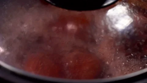 Slow motion hot soup in pot for cooking seafood of party, close up hand holding  Stock Footage 131872889