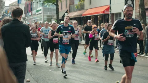 Slow Motion Of A Huge crowd Of Marathon Runners 스톡 동영상 255393235