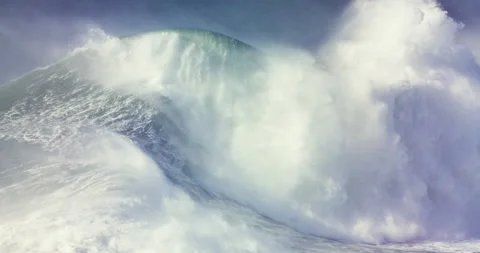 Slow motion of huge ocean wave swimming towards seashore and picking up height Stock Footage 155800438