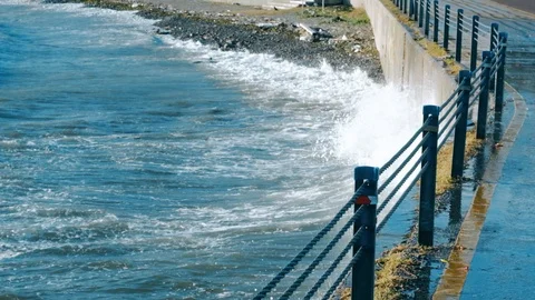 Slow motion huge waves crashing over seawall at daytime in Istanbul Stock-Footage 121532664