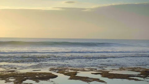 Slow motion of huge waves with splashes in high tide beach with brown sea Video stock 114819419
