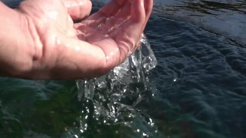 Slow motion human hand grabbing water environment. stream, clean, World water Stock Footage 270407921