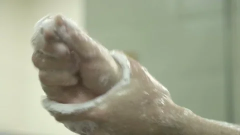 Slow motion of a human washing the hands Stock Footage 127861658