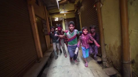 Slow-motion image of poor kids running, India Video stock 151865186