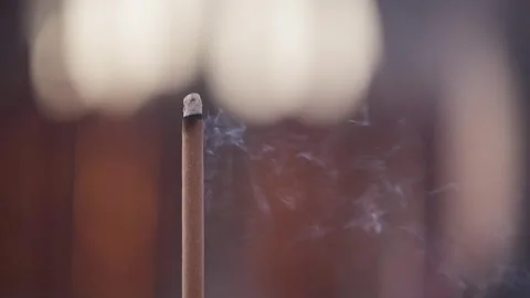 Slow motion of incense sticks burning in rows inside Taiwanese temple  Stock Footage 312278724