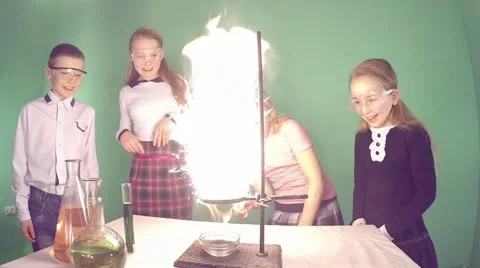 Slow motion. Interesting chemical experiments. Green background. Video stock 59869609