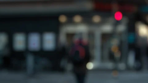 Slow motion, intersection with street pole in foreground. Out of focus Stock-Footage 94343369