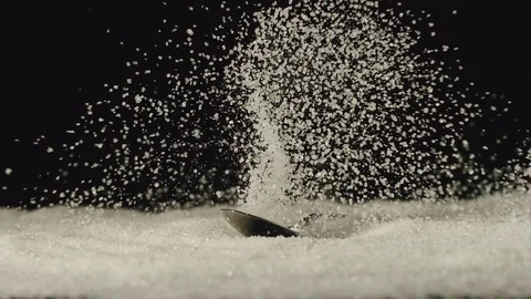 SLOW MOTION: Iron spoon with sugar falling in sugar - Splash Stock Footage 107501307