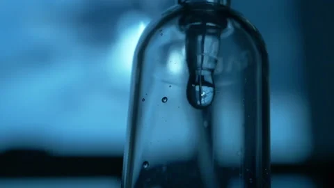 Slow motion, iv drip saline solution of medical Stock Footage 134679572