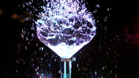 Slow Motion of a Jet of Water from a pipe on a black Stock Footage 87638920