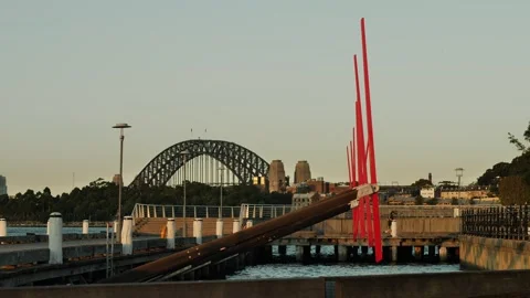 Slow motion jogger passing moving sculpture Tied to Tied in Sydney 4K Video stock 269743953