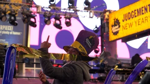 SLOW MOTION - Joyful Young Man Celebrating New Year's Eve in Times Square Stock Footage 122178582