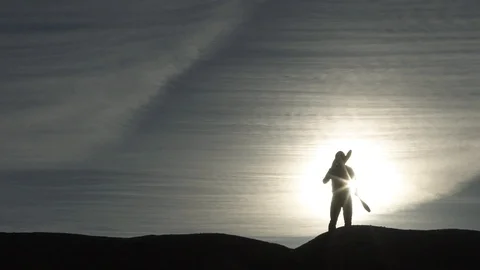 Slow Motion Juggling Batons Against The Sun Video stock 101283584