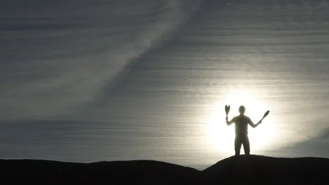 Slow Motion Juggling Sun Silhouette Video stock 101283612