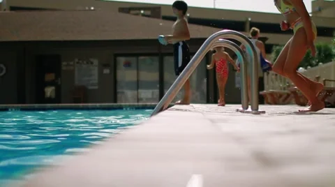 Slow Motion jumping in pool Stock Footage 52240996