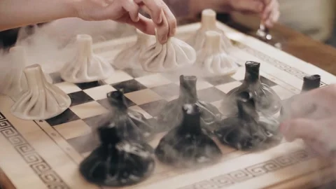 Slow motion khinkali in the smoke Stock Footage 141482553