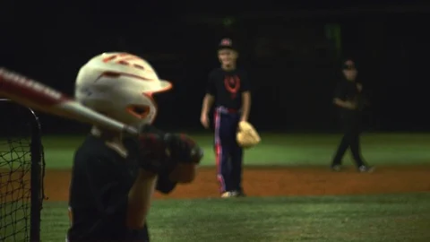 Slow motion of kid batting at baseball practice Stock Footage 106273462