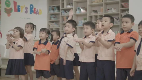 Slow motion Kids are clapping hands at kindergarten Stock Footage 133895322