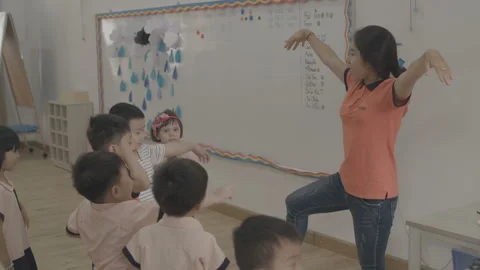 Slow motion Kids learn dancing at kindergarten Stock Footage 133895368