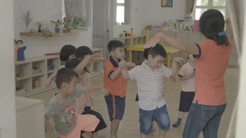 Slow motion Kids learn dancing at kindergarten Stock Footage 133895504