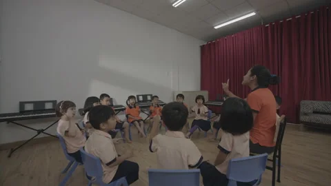 Slow motion Kids learn singing at kindergarten Stock Footage 133898954