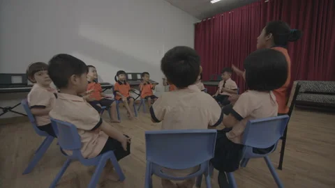 Slow motion Kids learn singing at kindergarten Stock Footage 133898998