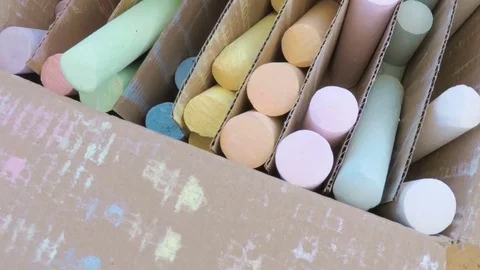 Slow motion. Kids picking chalk from the large box. Stock Footage 76778744