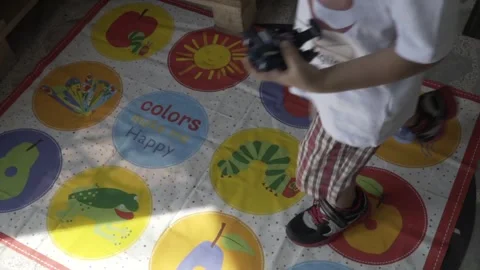 Slow Motion Of Kids Walking On A Mat With English Words Stock Footage 300727853