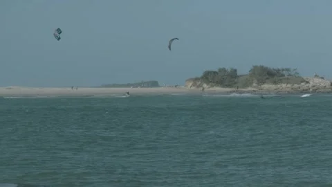 Slow Motion Kite Surfers Riding Waves Near Sandy Beach, Sunshine Coast, Australi Stock Footage 341307235