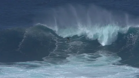 Slow Motion Kiteboarder gets a giant barrel on Maui, Hawaii, extreme sport Stock Footage 77611113