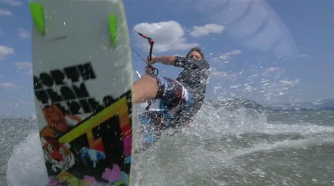 SLOW MOTION: Kiteboarder jumping into the camera Stock Footage 41100086